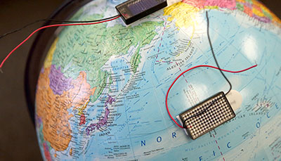 A globe with sensors on it. 